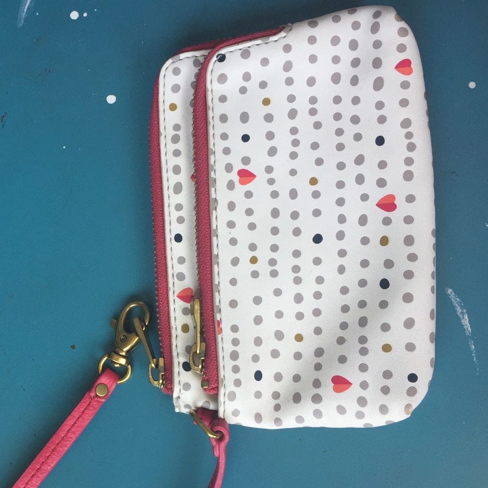 Fossil pink and white wristlet
